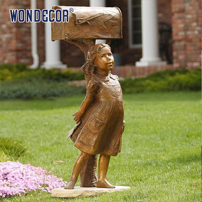 Little Girl Under A Copper Sculpture Metal Decorated Mailbox In Garden Courtyard