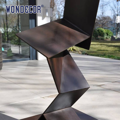 Large outdoor metal art, irregular geometry, weather resistant steel sculpture