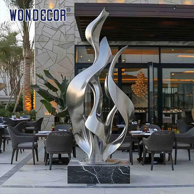 Large outdoor hotel gate forged metal abstract ribbon stainless steel sculpture