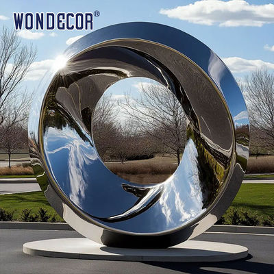 Large outdoor park shaped twisted ring stainless steel sculpture