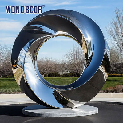Large outdoor park shaped twisted ring stainless steel sculpture